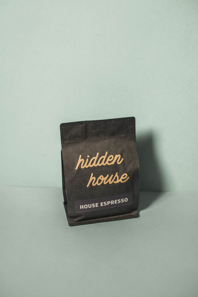 A black coffee bag of House Espresso