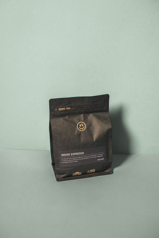 A picture of the back of a House Espresso coffee bag