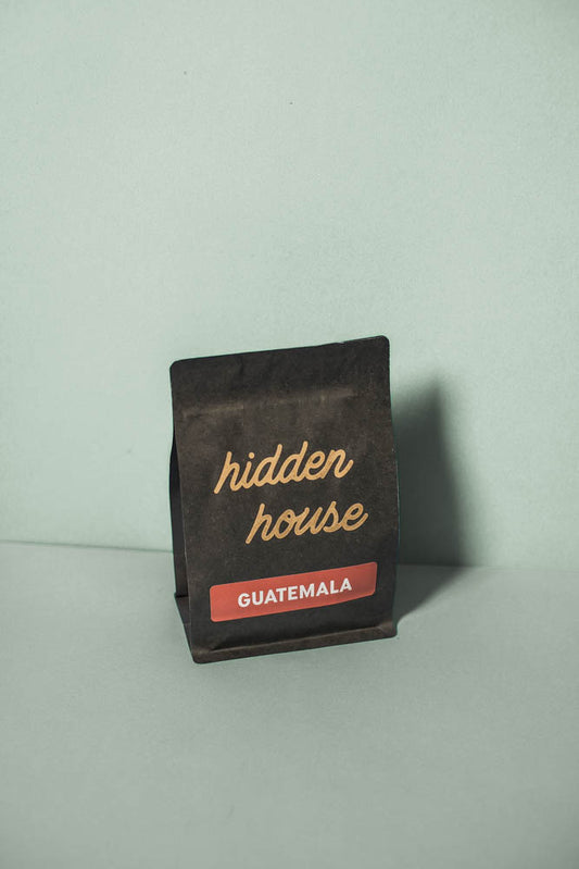 The front of a Guatemala coffee bag with a rust covered label