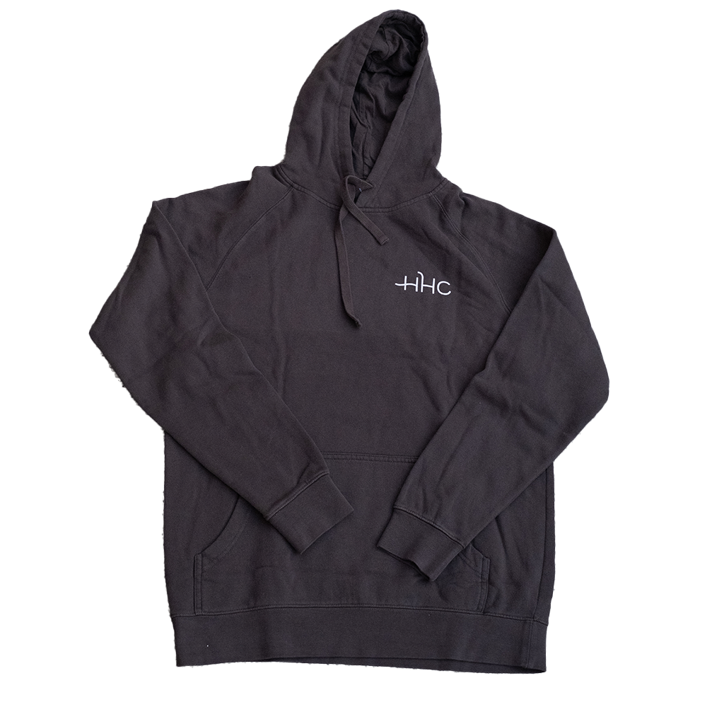 Image of front of black hoodie. HHC is incribed.