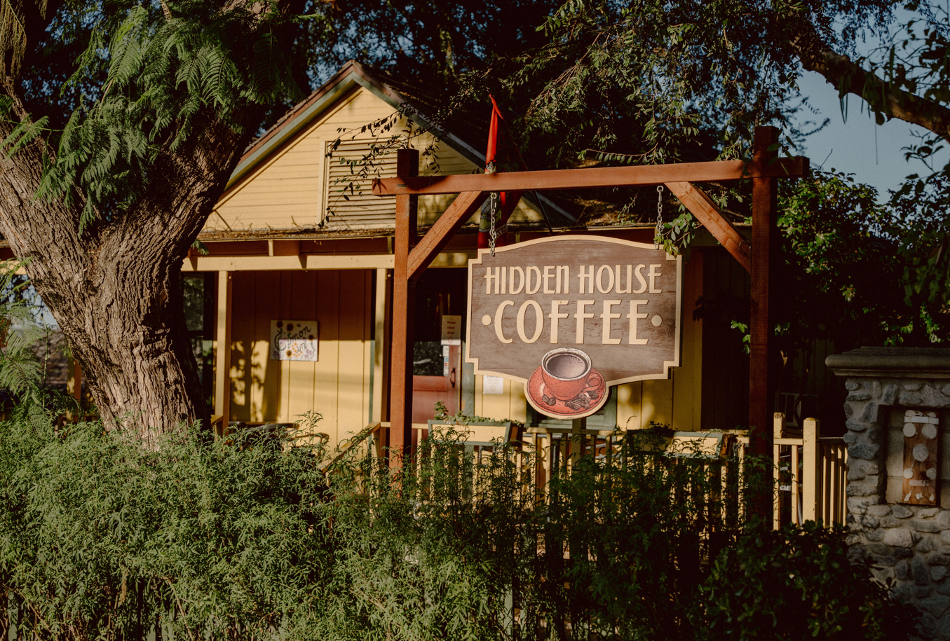 Image of Hidden House Coffee, surrounded by trees in San Juan Capistrano.