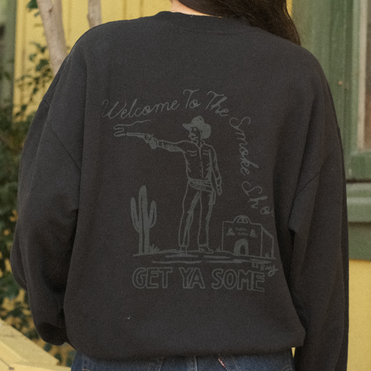 Back of smoke show sweatshirt showing graphic. Model is wearing sweatshirt.